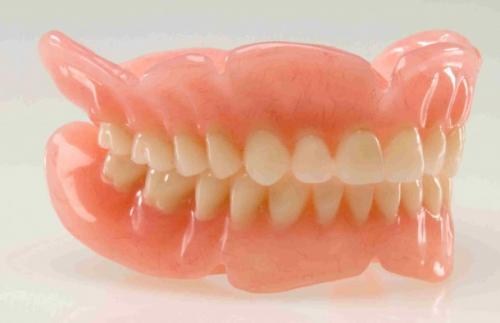 sự giống và khác nhau của răng tháo lắp và răng cố định 1